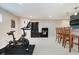 Basement with exercise bike and bar area at 16736 Lakeville Xing, Westfield, IN 46074