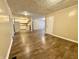 Open concept dining area with wood-look floors at 5557 E 41St St, Indianapolis, IN 46226