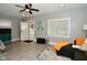 Living room with entryway, gray walls, and wood-look floors at 936 N Oxford St, Indianapolis, IN 46201