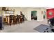 Finished basement with wet bar, gym area, and additional living space at 1398 Penny Ln, Greenfield, IN 46140