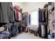 Large walk-in closet with ample hanging space and shelving at 1398 Penny Ln, Greenfield, IN 46140