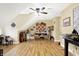 Bright craft room with hardwood floors, ceiling fan, and ample work space at 1398 Penny Ln, Greenfield, IN 46140