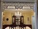 Formal dining room with a large table, chandelier, and built-in hutch at 1398 Penny Ln, Greenfield, IN 46140