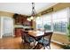 Charming dining area with built-in cabinetry and hardwood floors at 1398 Penny Ln, Greenfield, IN 46140