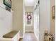 Inviting entry with built-in bench, storage, and tiled floor at 1398 Penny Ln, Greenfield, IN 46140