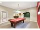 Game room featuring pool table, carpeted floors, accent lighting, open layout, and white trim at 1398 Penny Ln, Greenfield, IN 46140