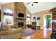 Cozy Gathering room featuring a floor-to-ceiling stone fireplace at 1398 Penny Ln, Greenfield, IN 46140