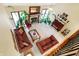 High-ceilinged living room with fireplace and two sofas, viewed from above at 1398 Penny Ln, Greenfield, IN 46140