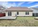 Backyard showcasing a wooden deck and a well-maintained lawn at 14944 Mia Dr, Carmel, IN 46033