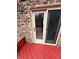 Close up of the sliding glass door entrance to the deck from the house at 409 Lansdowne Rd, Indianapolis, IN 46234