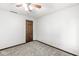 Bedroom featuring carpet and a wooden paneled door at 409 Lansdowne Rd, Indianapolis, IN 46234