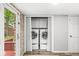 Convenient laundry room with modern washer and dryer, ample storage, and easy access to the outside at 409 Lansdowne Rd, Indianapolis, IN 46234