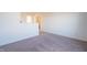 Simple bedroom with carpeted floor and lots of natural light at 4612 Amber Wood Dr, Indianapolis, IN 46235