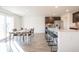 Kitchen dining area with large table and sliding glass door at 4612 Amber Wood Dr, Indianapolis, IN 46235