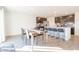 Bright dining area with table and chairs near kitchen at 4612 Amber Wood Dr, Indianapolis, IN 46235