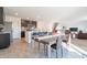 Open concept kitchen with island and view of living room at 4612 Amber Wood Dr, Indianapolis, IN 46235