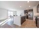 Modern kitchen with stainless steel appliances and island at 4612 Amber Wood Dr, Indianapolis, IN 46235