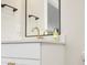 Bathroom features a marble countertop, gold fixtures, and a modern mirror at 467 Rayle Dr, Carmel, IN 46032