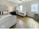 Stylishly decorated bedroom showcasing two twin beds, side table, and charming decor accents at 467 Rayle Dr, Carmel, IN 46032