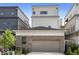 The two car garage is located at the rear of the home with alley access at 467 Rayle Dr, Carmel, IN 46032