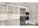 Elegant kitchen cabinetry with modern appliances, under-cabinet lighting, and a sleek design at 467 Rayle Dr, Carmel, IN 46032
