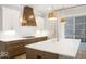 Kitchen showcasing a large center island, modern appliances, and access to the outdoor patio at 467 Rayle Dr, Carmel, IN 46032