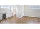 Spacious living room features hardwood floors, a wet bar, and natural light at 467 Rayle Dr, Carmel, IN 46032