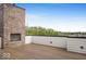 Relax on this rooftop deck with brick fireplace and enjoy outdoor living at 467 Rayle Dr, Carmel, IN 46032