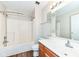 Bathroom with tub/shower combo, vanity with single sink at 5921 Bastille Ln, Indianapolis, IN 46254