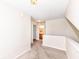 Loft bedroom with carpeting and ceiling fan, hallway access to bathroom at 5921 Bastille Ln, Indianapolis, IN 46254