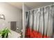 Updated bathroom with a large shower, stylish shower curtain, and modern vanity at 11 Eastern Ave, Brownsburg, IN 46112