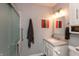 Clean bathroom with a walk-in shower, updated vanity, and modern fixtures at 11 Eastern Ave, Brownsburg, IN 46112