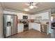 Modern kitchen with stainless steel appliances and white cabinetry at 11 Eastern Ave, Brownsburg, IN 46112