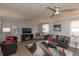 Living room with hardwood floors, fireplace, and comfortable seating at 11 Eastern Ave, Brownsburg, IN 46112