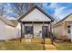 Charming, newly constructed home with black and white exterior at 1125 California St, Columbus, IN 47201