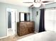 Main bedroom with dresser and en-suite bathroom access at 1165 Grassy Creek Cir, Franklin, IN 46131