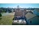 Aerial view of a home with a wooden deck and surrounding neighborhood at 12216 Laurelwood Ct, Indianapolis, IN 46236