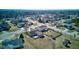 A beautiful aerial view of the property showcasing the backyard with shed and surrounding neighborhood at 12216 Laurelwood Ct, Indianapolis, IN 46236