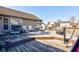 Wide view of a wooden back deck with patio furniture perfect for entertaining at 12216 Laurelwood Ct, Indianapolis, IN 46236