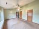 Spacious bedroom with ample natural light and a ceiling fan for added comfort at 12216 Laurelwood Ct, Indianapolis, IN 46236