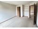 Bedroom with closet and bonus shelving, featuring neutral carpeting and ample natural light at 12216 Laurelwood Ct, Indianapolis, IN 46236