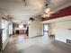 View of the spacious living room with an open floor plan connected to the kitchen at 12216 Laurelwood Ct, Indianapolis, IN 46236