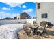 Patio with seating area and grill, winter scene at 1401 W Springhurst Blvd, Greenfield, IN 46140