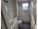 Bathroom with shower/tub combo and vanity at 2826 Station St, Indianapolis, IN 46218