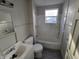 Bathroom with shower/tub combo and vanity at 2826 Station St, Indianapolis, IN 46218