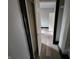 Hallway view of bedroom with wood-look flooring at 2826 Station St, Indianapolis, IN 46218