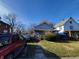Small gray house with a front porch,needs landscaping at 2826 Station St, Indianapolis, IN 46218