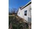 Side view of house with gray siding at 2826 Station St, Indianapolis, IN 46218