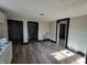 Renovated kitchen with white cabinets and new flooring at 2826 Station St, Indianapolis, IN 46218