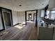 Updated kitchen with white cabinets and new flooring at 2826 Station St, Indianapolis, IN 46218